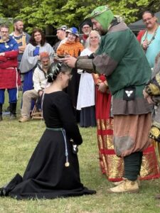 Prince Ozurr crowns Lady Hemma as his Consort at Crown Tourney in the Barony of An Dubhaigeainn, AS LXI
